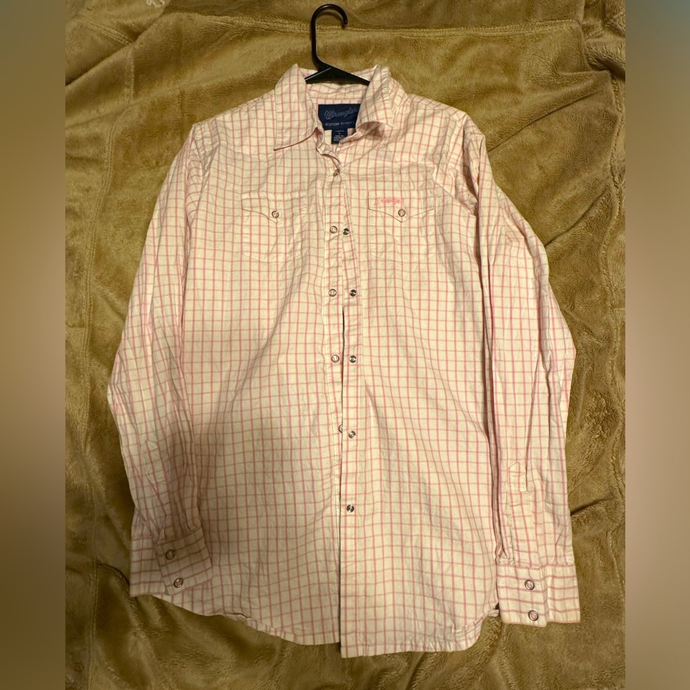 Women’s long sleeve button up shirt. Tough enough to wear pink.
